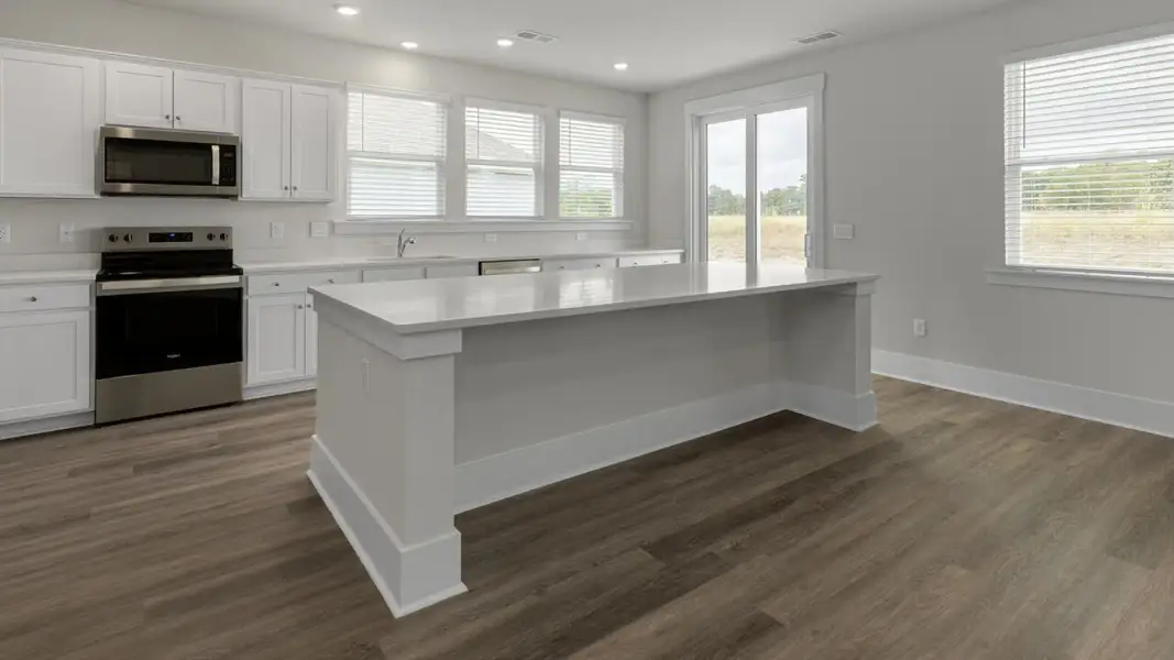 Furnished interior view inside a new home in The Highlands at Cedar Hill Landing, Navassa (Image 6).