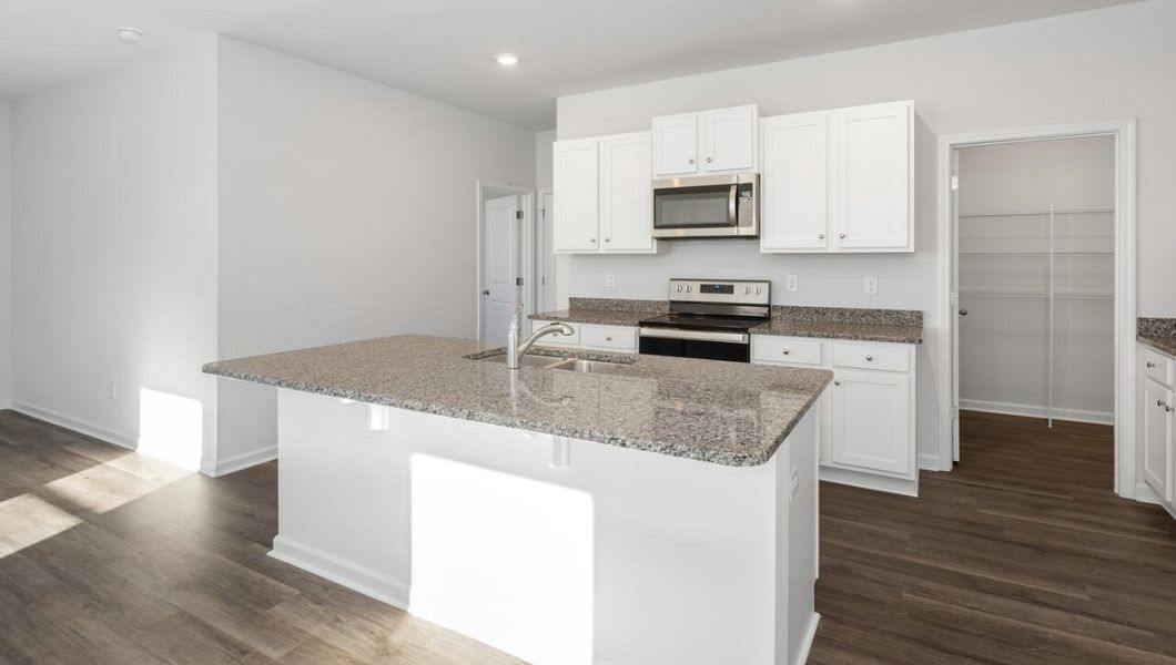 Furnished interior view inside a new home in The Pines at Blake Farm, Wilmington (Image 4).