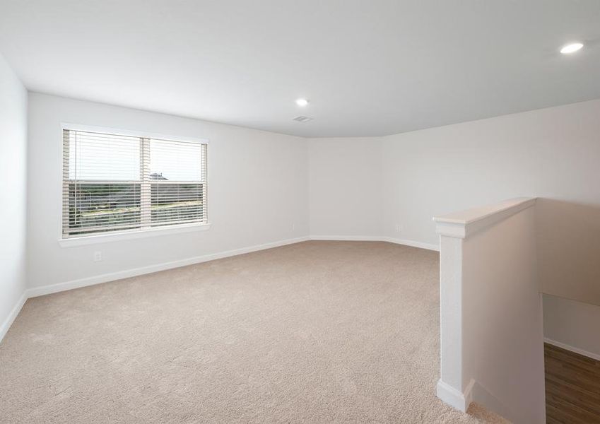 Upstairs game room with carpet