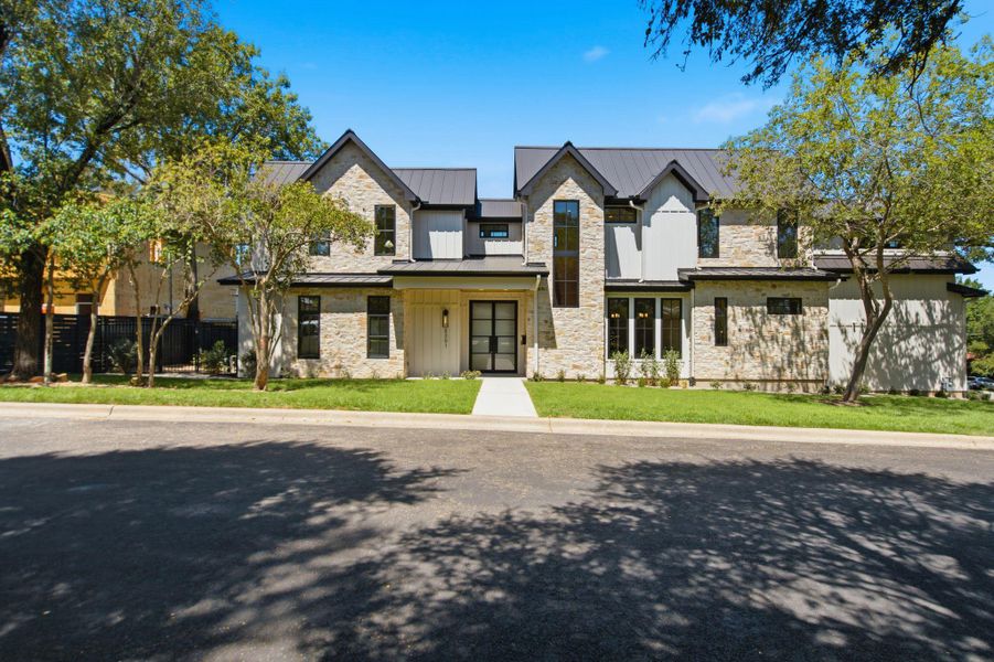 Front exterior of a new home in , Austin, TX, highlighting curb appeal (Image 24).
