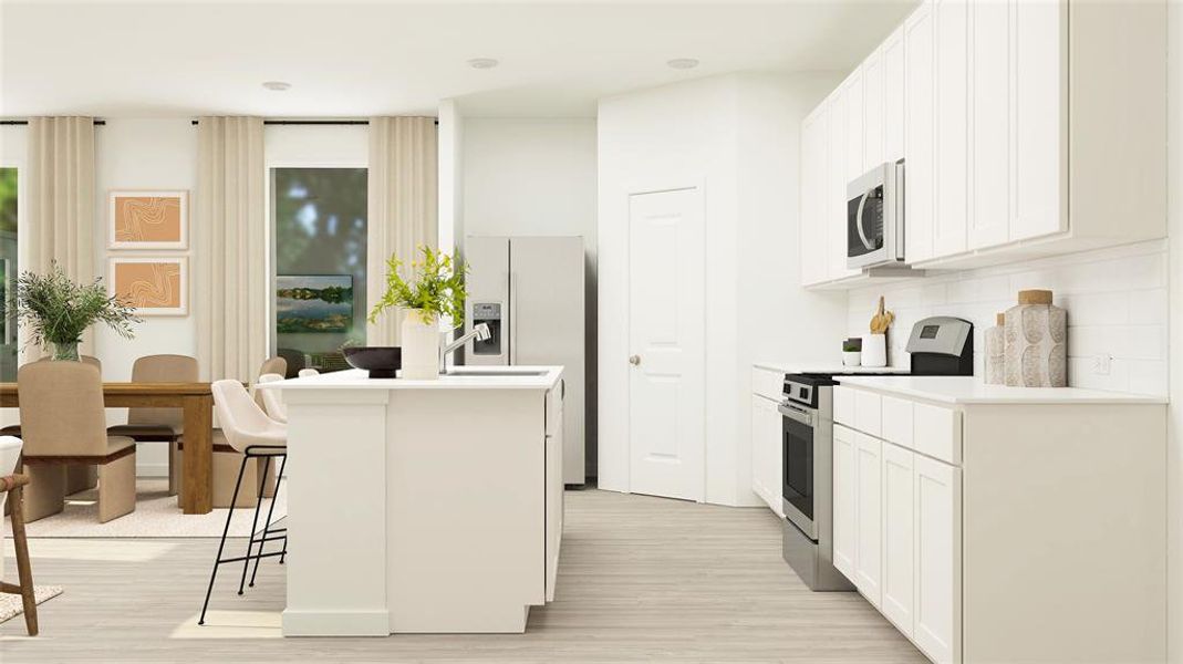 Kitchen with backsplash, white cabinets, light hardwood / wood-style floors, a kitchen bar, and stainless steel appliances