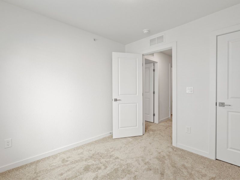 Spacious, unfurnished interior of a new home in The Vistas at West Mesa, Colorado Springs (Image 21).