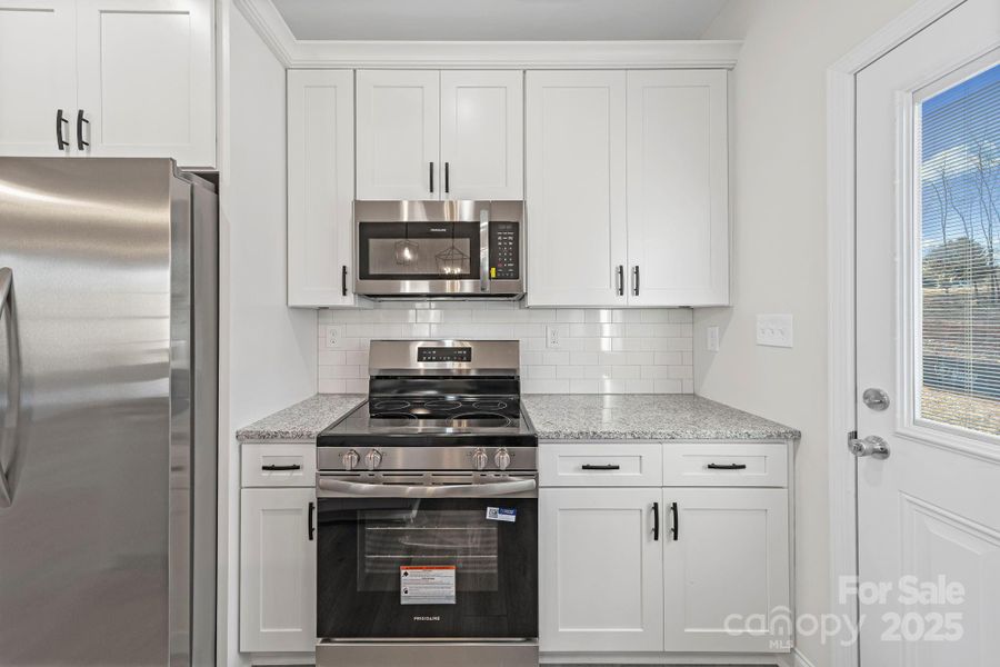 Furnished interior view inside a new home in , Monroe (Image 7).