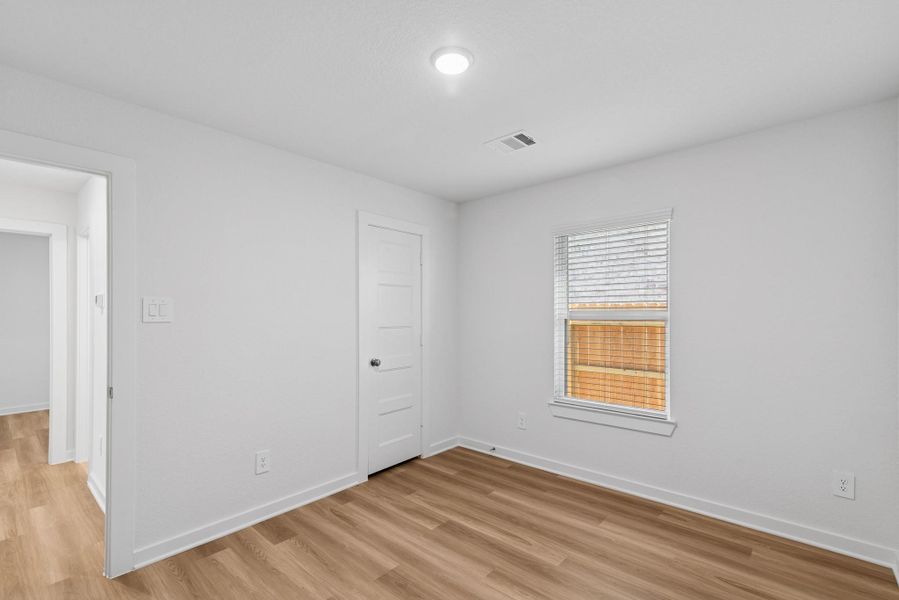 Spacious, unfurnished interior of a new home in Wildrye, Waller (Image 32).