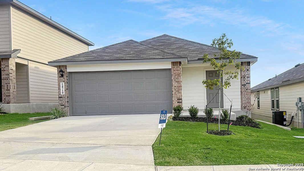 Front exterior of a new home in Stonehill, San Antonio, TX, highlighting curb appeal (Image 1). Front exterior of a new home in Stonehill, San Antonio, TX, highlighting curb appeal (Image 1).