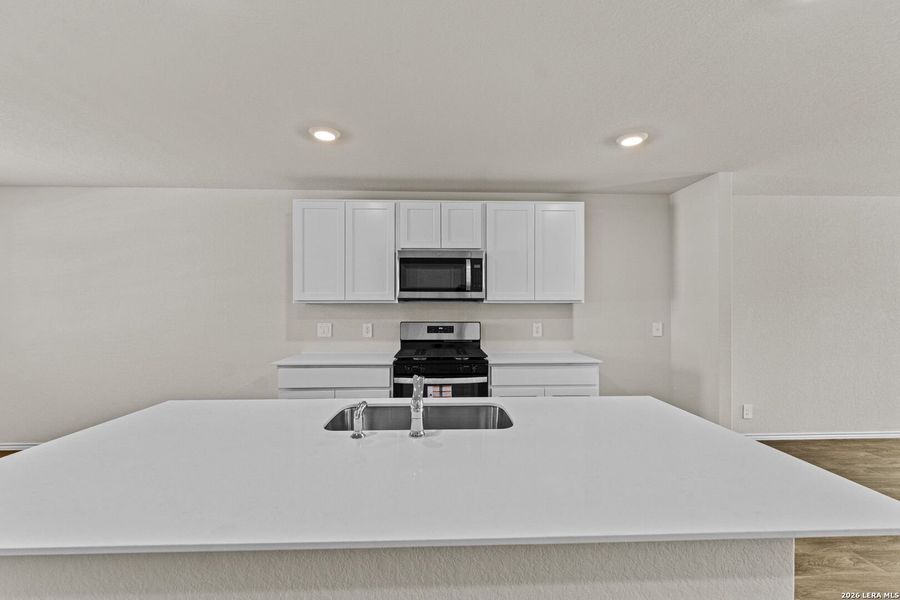 Furnished interior view inside a new home in Redbird Ranch, San Antonio (Image 11).