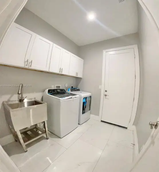 Furnished interior view inside a new home in , Port St. Lucie (Image 10).