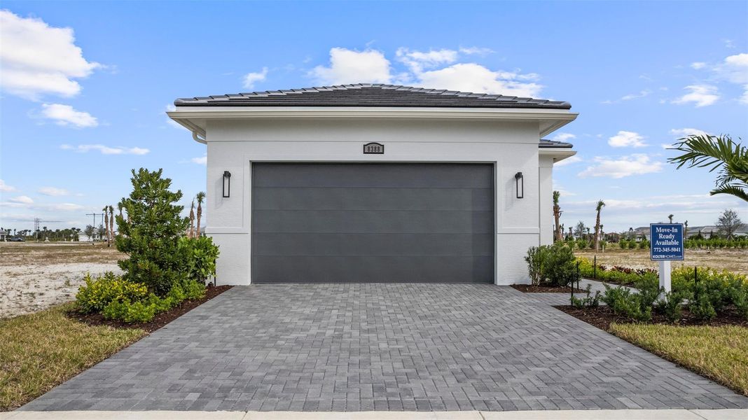Front exterior of a new home in , Port St. Lucie, FL, highlighting curb appeal (Image 2).