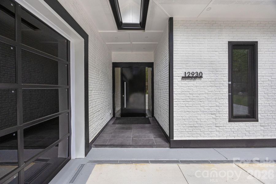 Exterior details and patio area of a home in , Charlotte (Image 24).
