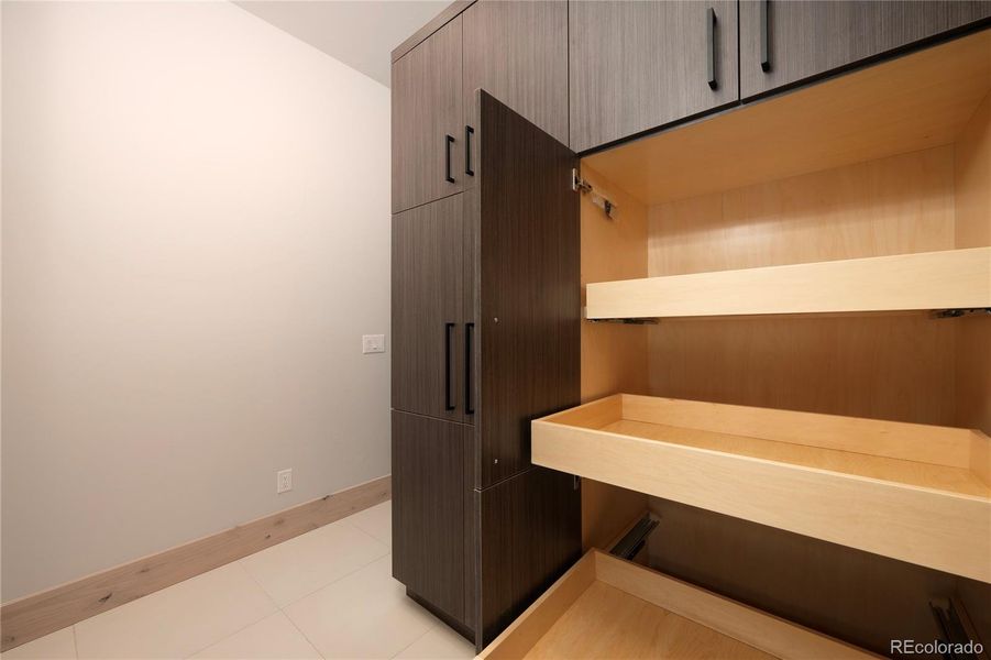 Custom cabinet pantry. Upper cabinets; lower pullouts