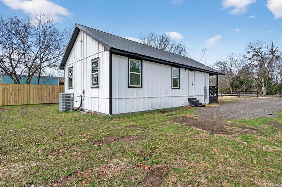 Exterior details and patio area of a home in , Dawson (Image 16).