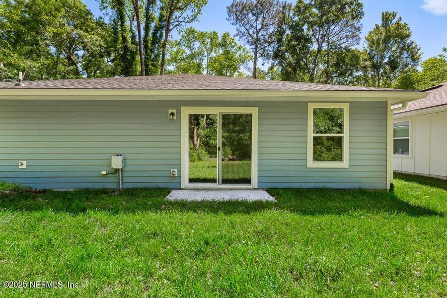 Front exterior of a new home in , Jacksonville, FL, highlighting curb appeal (Image 20).