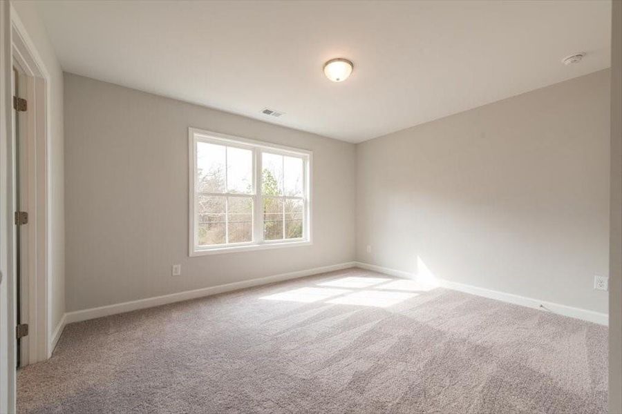 Spacious, unfurnished interior of a new home in Wilkins Walk, Mableton (Image 12).