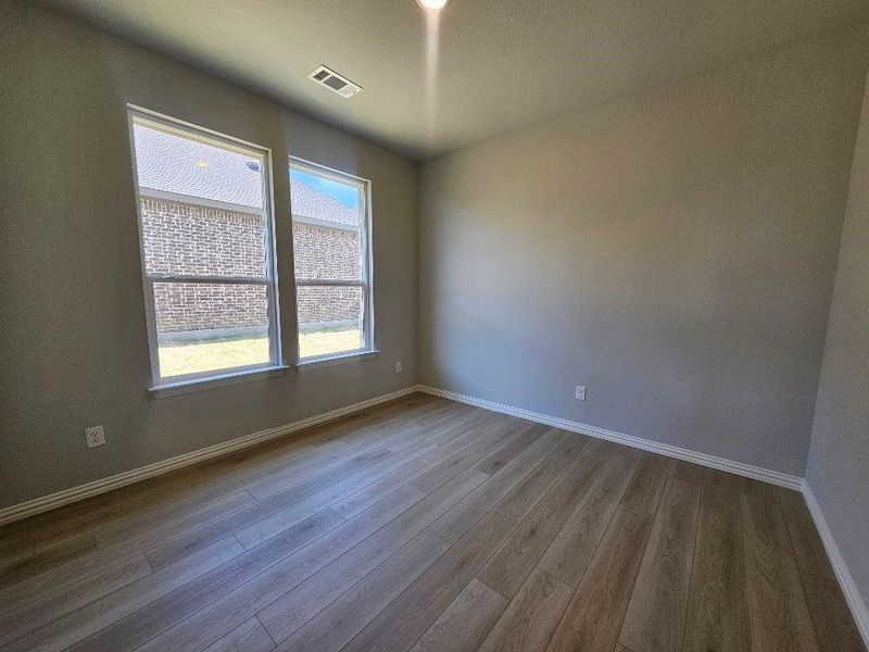 Spacious, unfurnished interior of a new home in The Hollow, Ennis (Image 9).