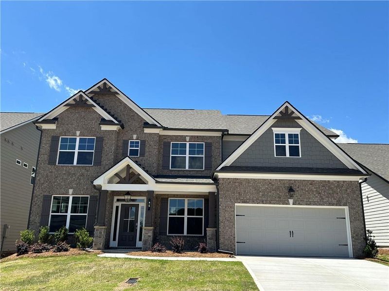 Front exterior of a new home in Summerlin, Winder, GA, highlighting curb appeal (Image 43).