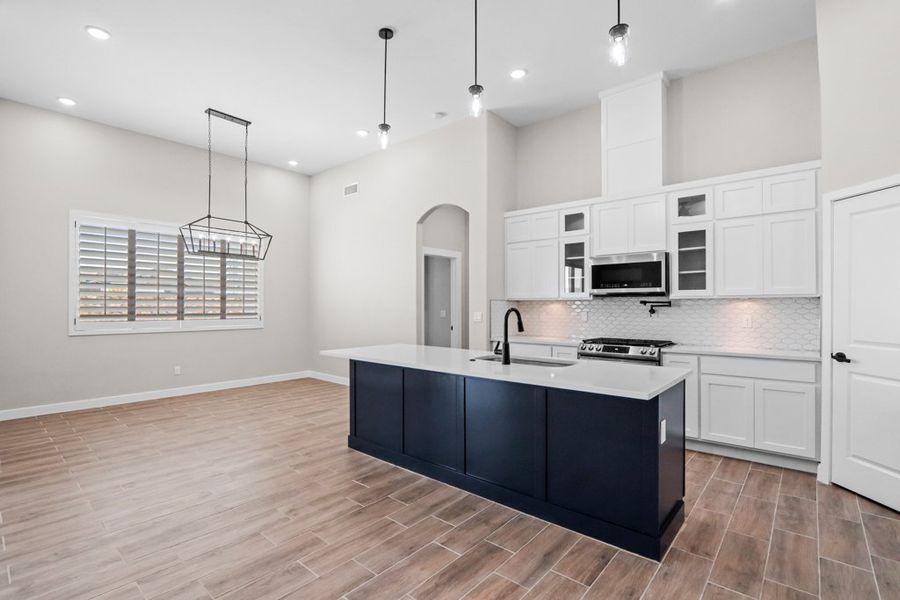 Representative furnished interior of a home built from the Torrey Pines by LEH. Homes in Verdancia, El Paso (Image 11).