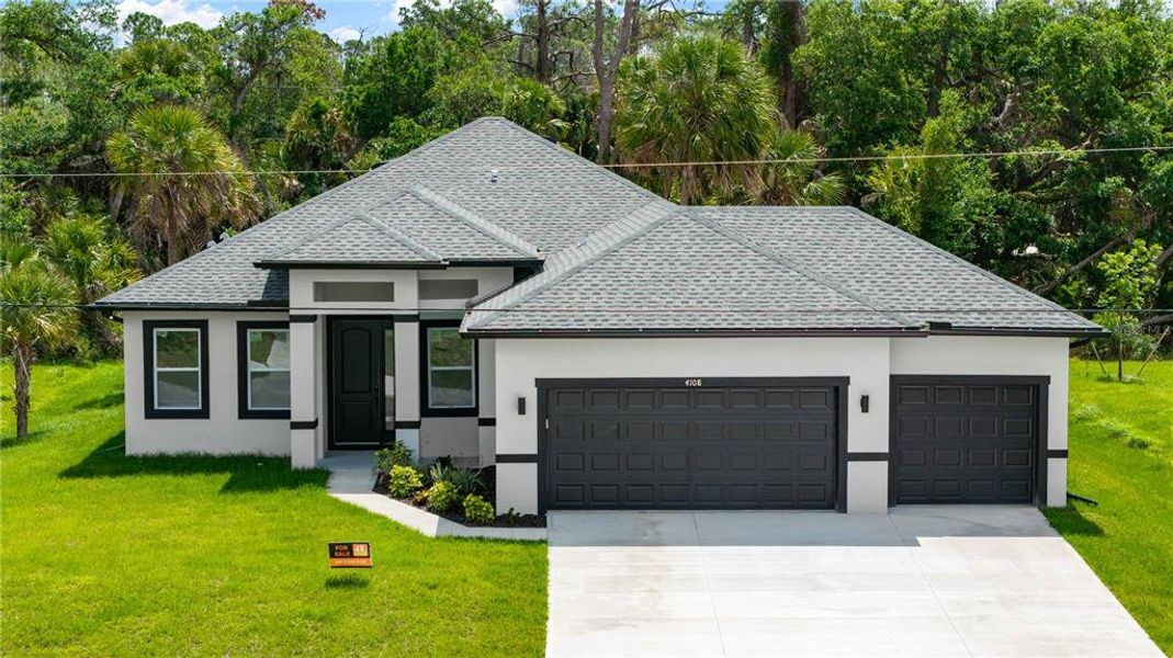 Front exterior of a new home in , North Port, FL, highlighting curb appeal (Image 20).