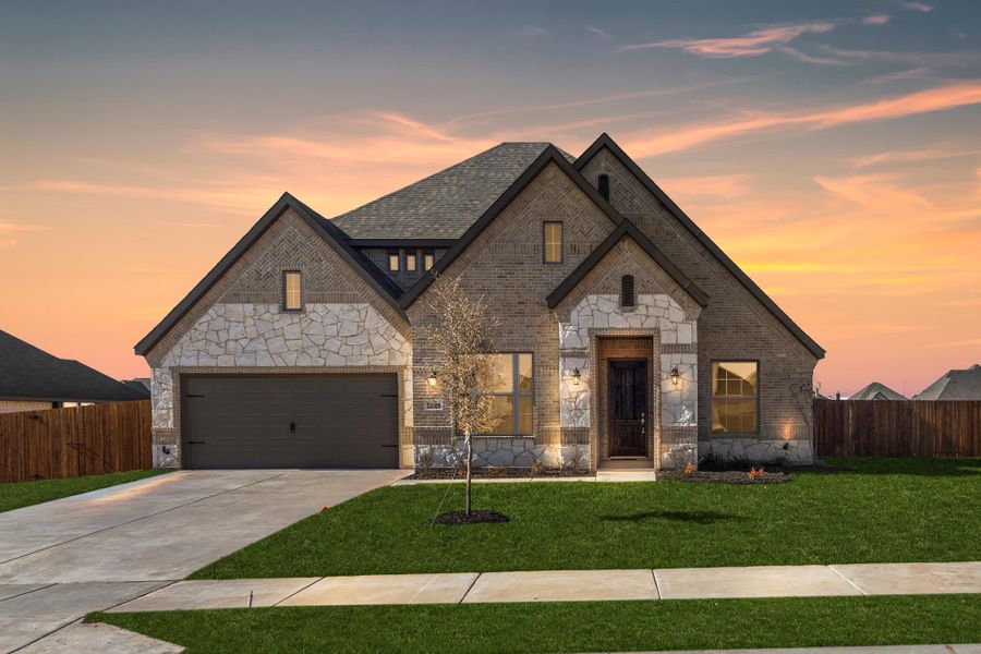 Elevation C with Stone | Concept 2434 at Coyote Crossing in Godley, TX by Landsea Homes