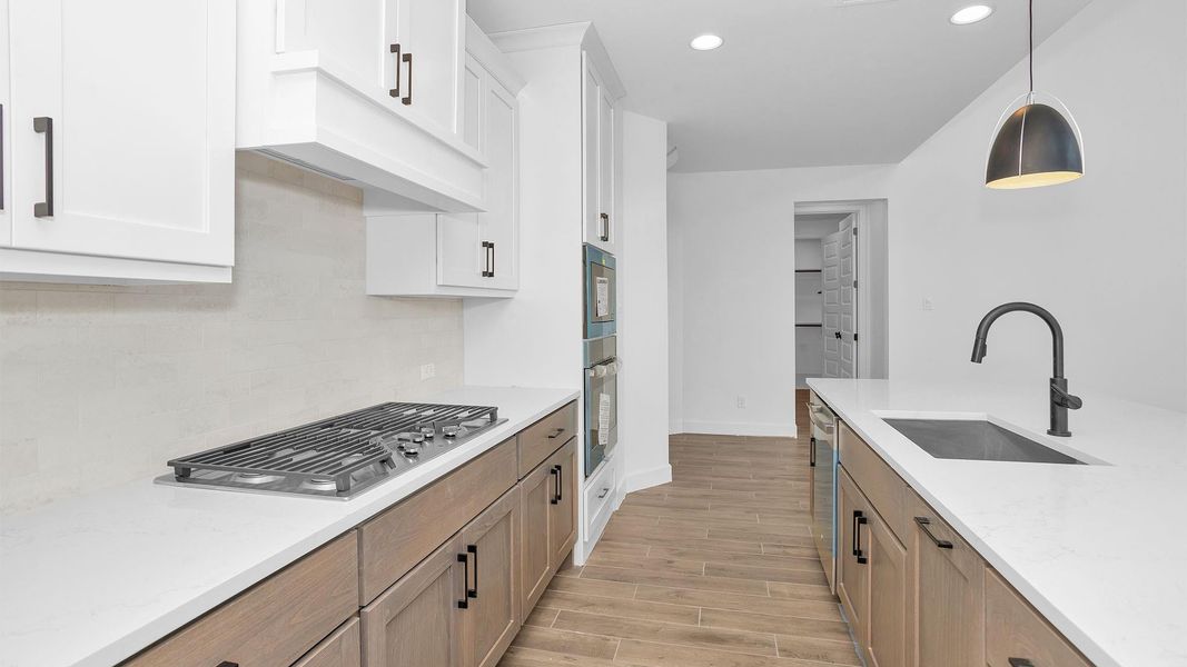 Furnished interior view inside a new home in Midline, Houston (Image 6).