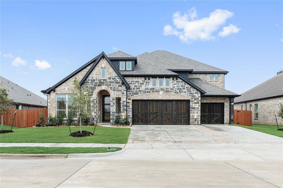 Front exterior of a new home in Villages of Walnut Grove, Midlothian, TX, highlighting curb appeal (Image 2).