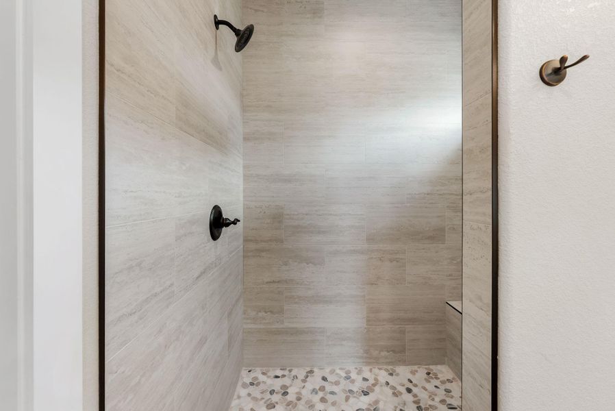 Bathroom featuring a shower stall