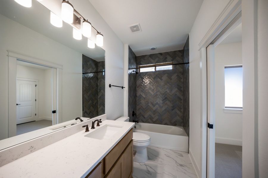 Representative furnished interior of a home built from the The Travis by Whitestone Custom Homes in Johnson Ranch, Bulverde (Image 20).
