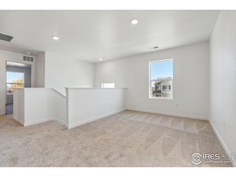 Spacious, unfurnished interior of a new home in Silver Peaks, Lochbuie (Image 21).