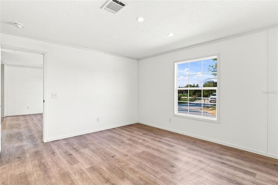 Spacious, unfurnished interior of a new home in , Okeechobee (Image 12).