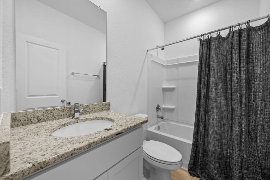 Full bath in between two bedrooms for convivence.
