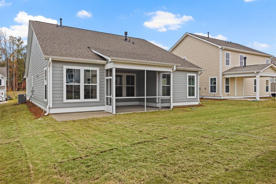 Front exterior of a new home in High Point at Foxbank, Moncks Corner, SC, highlighting curb appeal (Image 1).