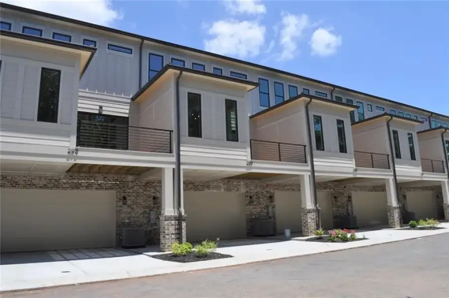 Front exterior of a new home in , Marietta, GA, highlighting curb appeal (Image 1). Front exterior of a new home in , Marietta, GA, highlighting curb appeal (Image 1).