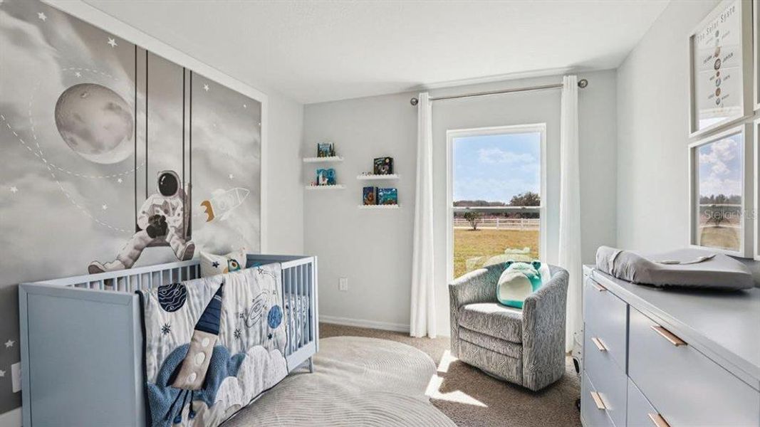 Furnished interior view inside a new home in Lake Deer Estates, Poinciana (Image 30).