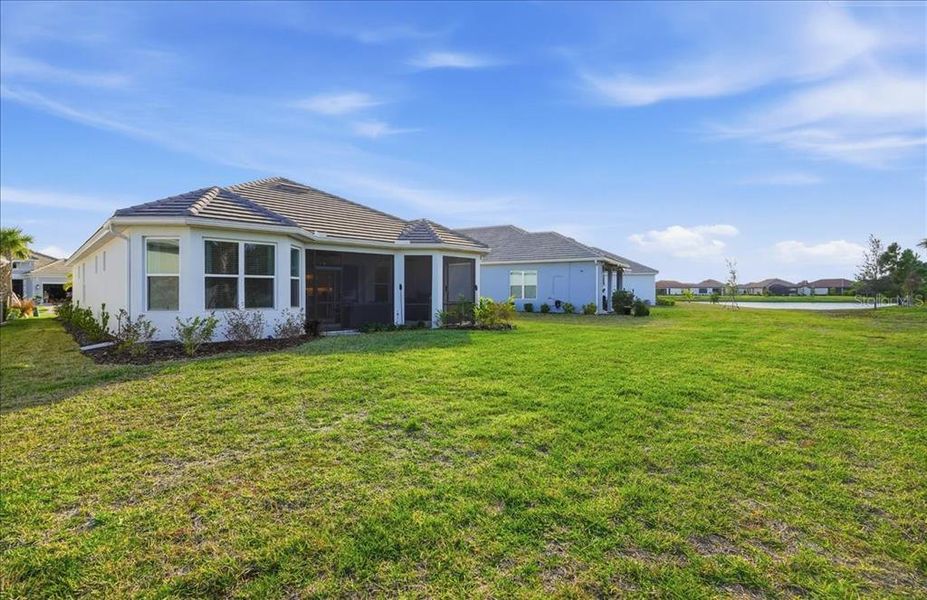 Exterior details and patio area of a home in Esplanade at Artisan Lakes, Palmetto (Image 3).