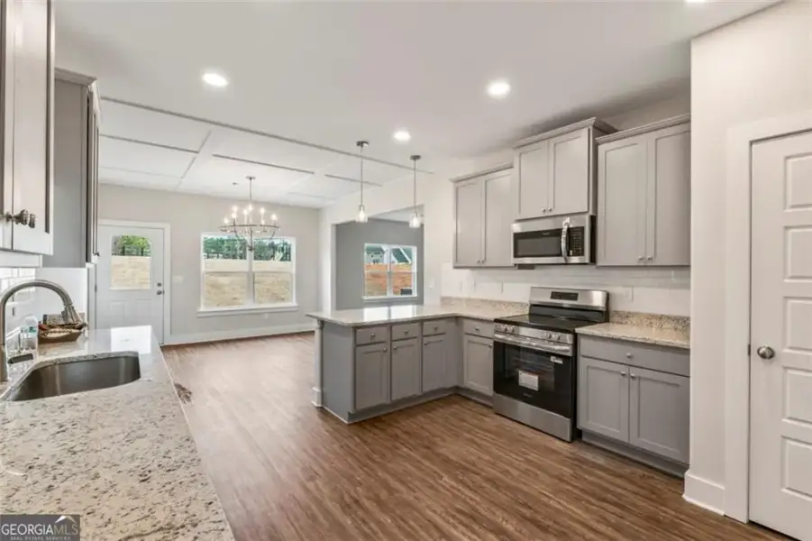 Furnished interior view inside a new home in , Hampton (Image 4).