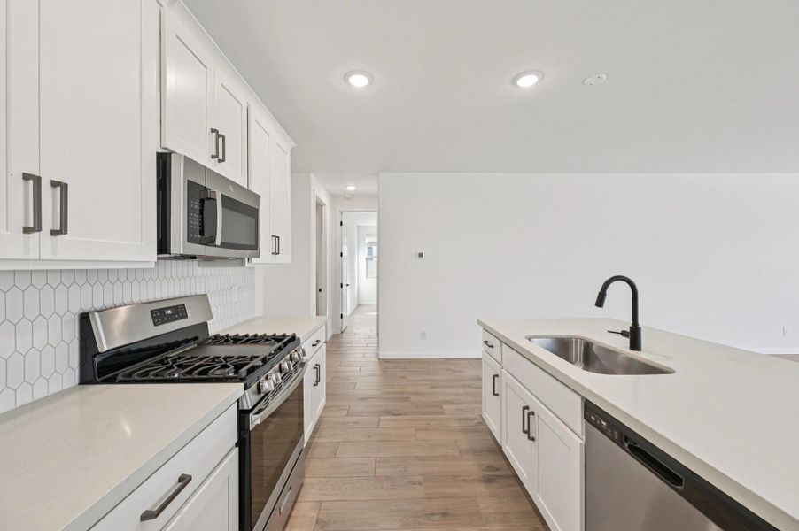 Kitchen featuring the Harmony Collection. Not actual home, finishes may vary. Kitchen featuring the Harmony Collection. Not actual home, finishes may vary.