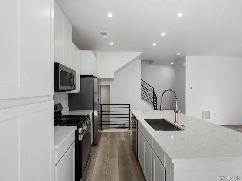 Furnished interior view inside a new home in The Hub at Virginia Village, Denver (Image 9). Furnished interior view inside a new home in The Hub at Virginia Village, Denver (Image 9).