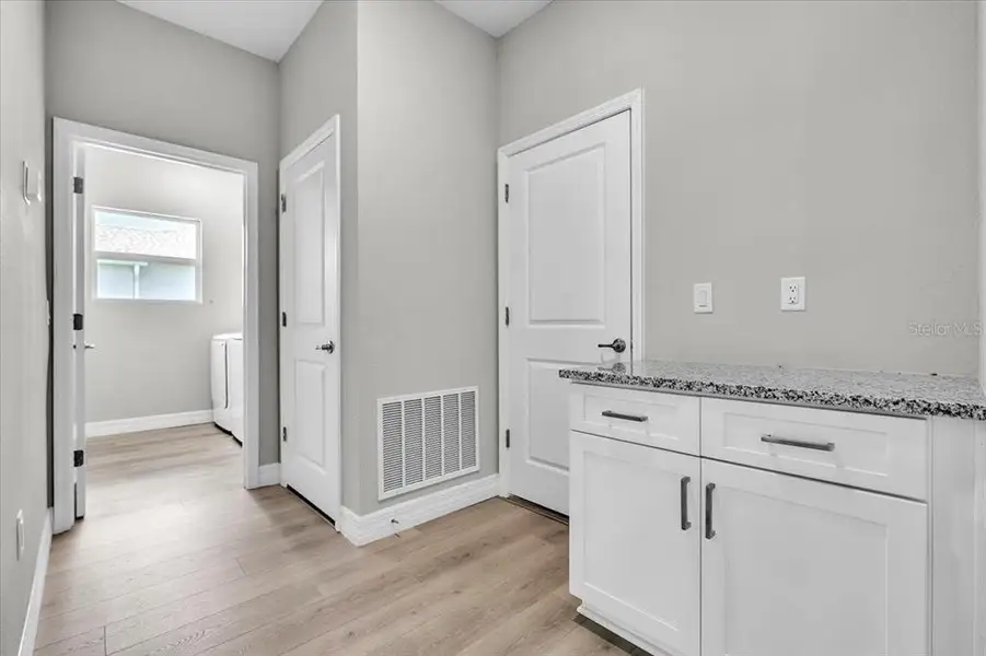 Furnished interior view inside a new home in , Punta Gorda (Image 11).