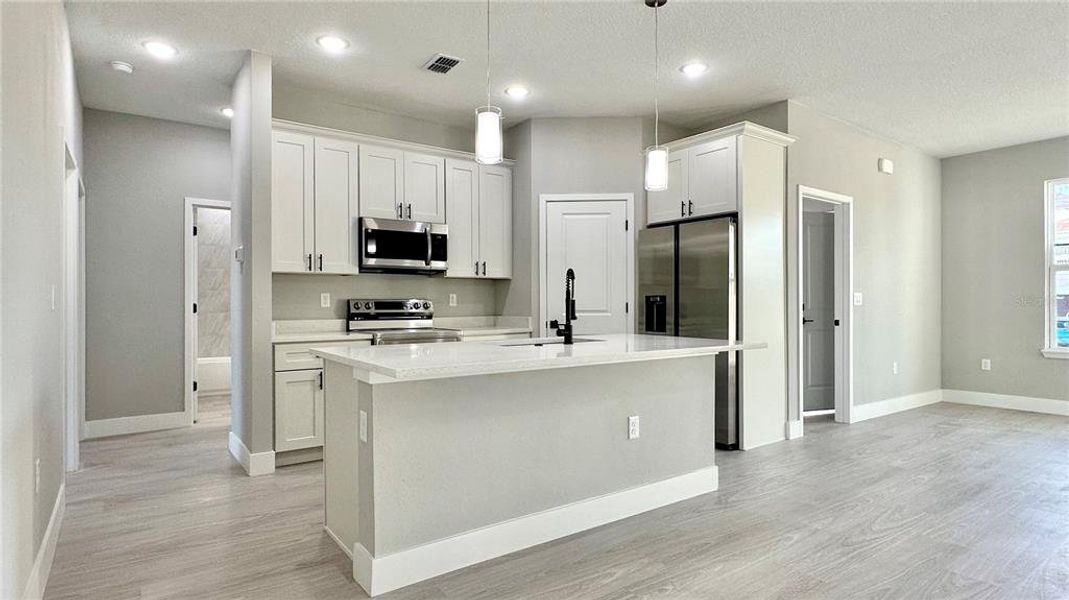 Furnished interior view inside a new home in , Poinciana (Image 14).