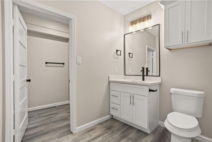 En suite bathroom in the second bathroom which also has a door to the exterior