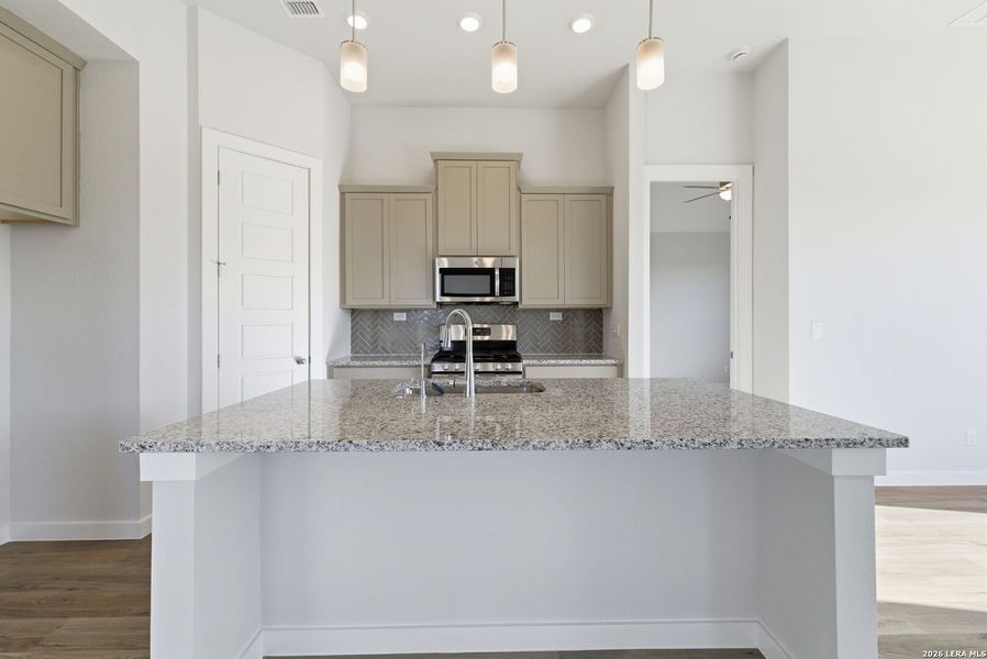 Furnished interior view inside a new home in The Meadows at Hunters Ranch, San Antonio (Image 12).