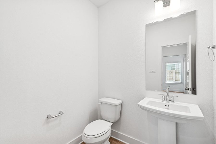 Furnished interior view inside a new home in Lone Star Landing, Montgomery (Image 6).