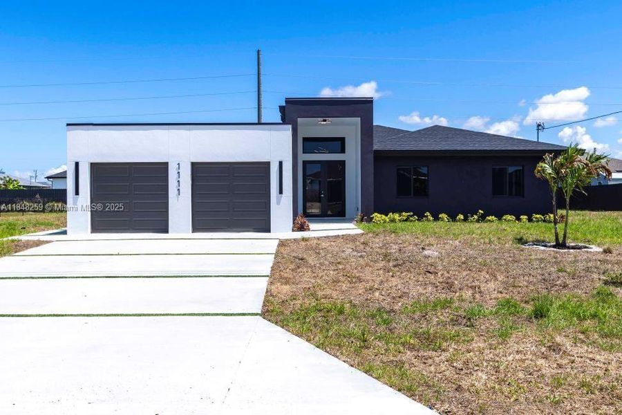 Front exterior of a new home in , Cape Coral, FL, highlighting curb appeal (Image 15).
