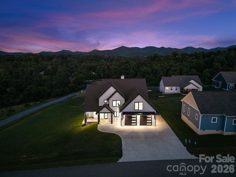 Front exterior of a new home in , Candler, NC, highlighting curb appeal (Image 2). Front exterior of a new home in , Candler, NC, highlighting curb appeal (Image 2).