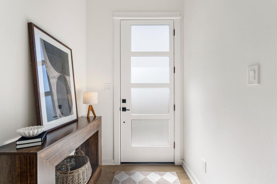 Step inside to a bright and welcoming entryway.
