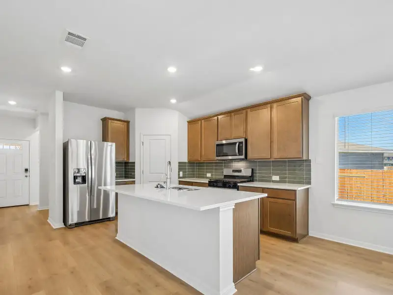 Furnished interior view inside a new home in Waterstone Crossing, Kyle (Image 3).
