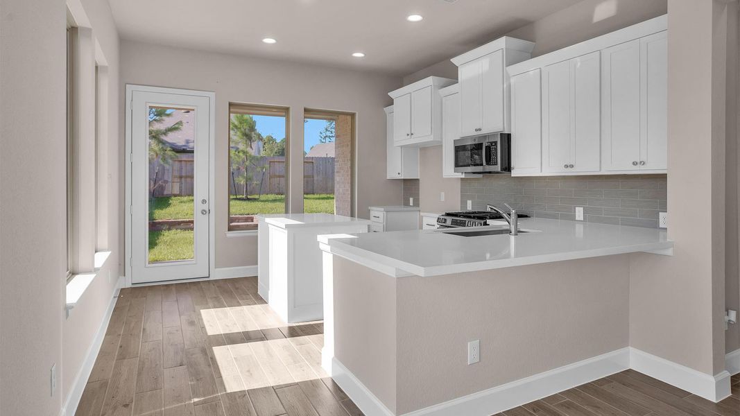 Furnished interior view inside a new home in The Woodlands Hills 40', Willis (Image 6). Furnished interior view inside a new home in The Woodlands Hills 40', Willis (Image 6).