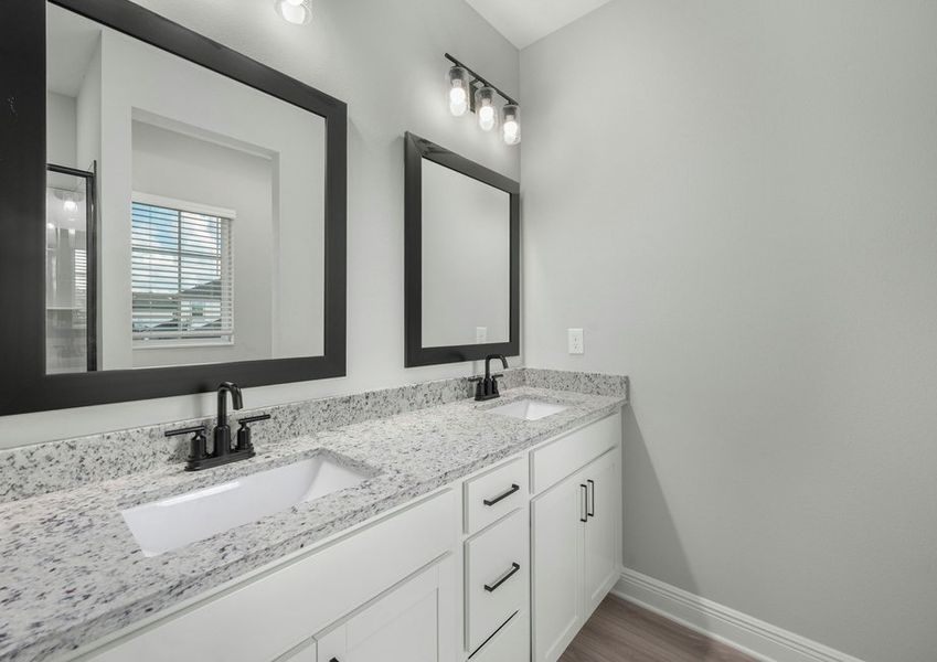 The master bathroom includes this stunning dual sink vanity!