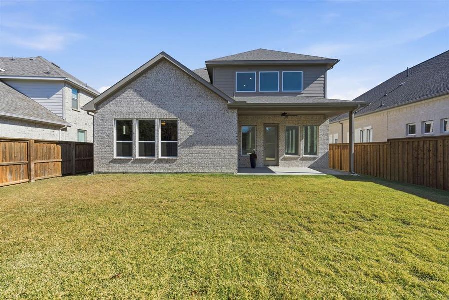 Exterior details and patio area of a home in Walsh Ranch, Fort Worth (Image 26).