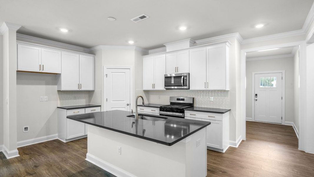 Furnished interior view inside a new home in Horton Park, Apex (Image 7).