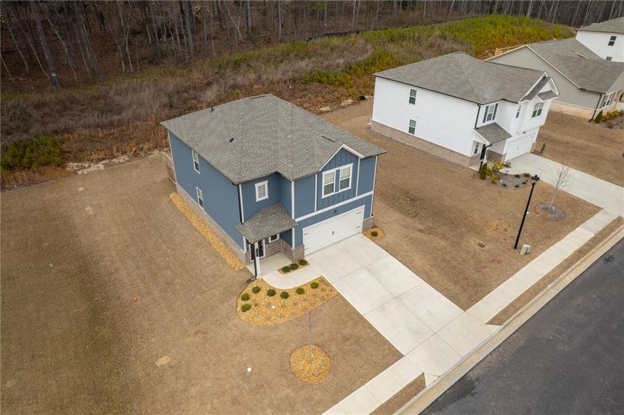 Front exterior of a new home in , Adairsville, GA, highlighting curb appeal (Image 1). Front exterior of a new home in , Adairsville, GA, highlighting curb appeal (Image 1).